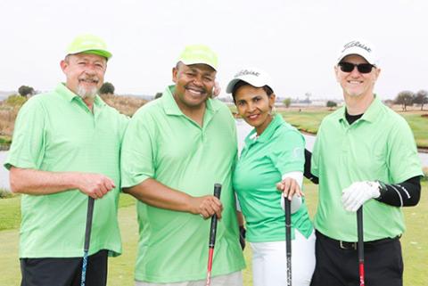 Motodi Maserumule and others golfing